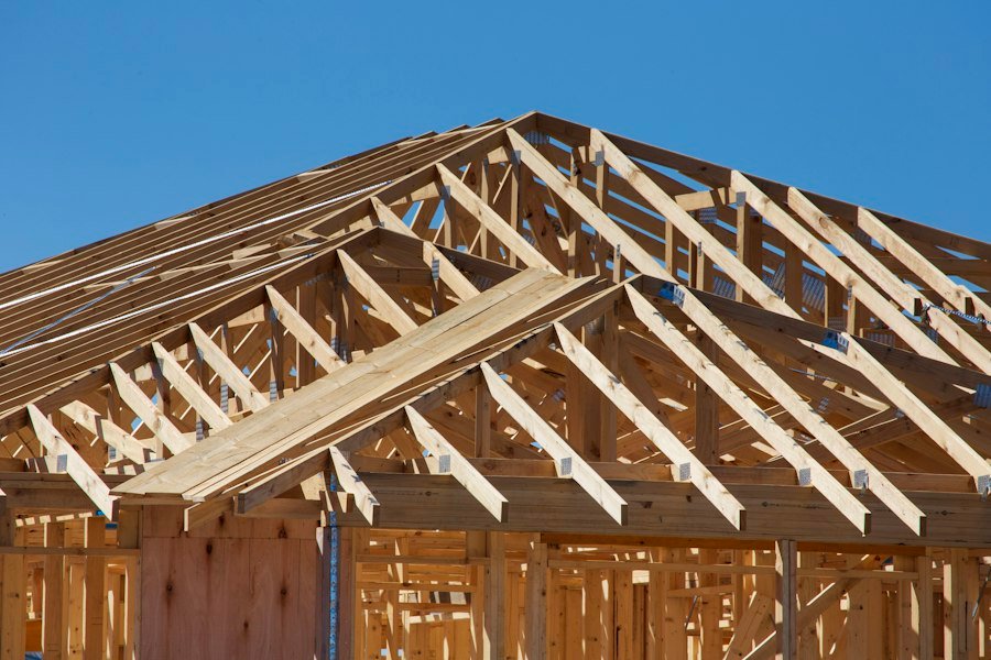 House under construction with wooden framing
